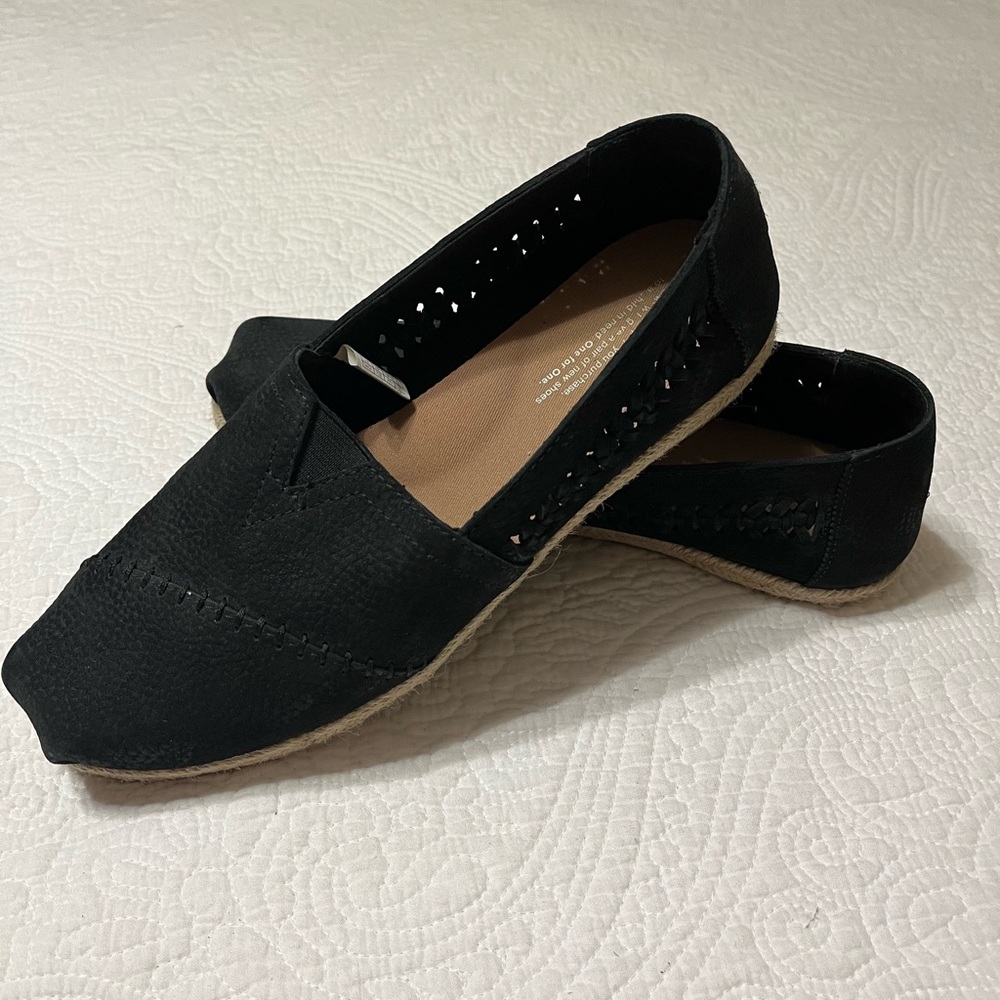 Tom’s Black slip ons